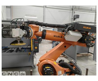 Szlifująco-tnący robot Kuka KR 210 R2700 prime ze stołem obrotowym